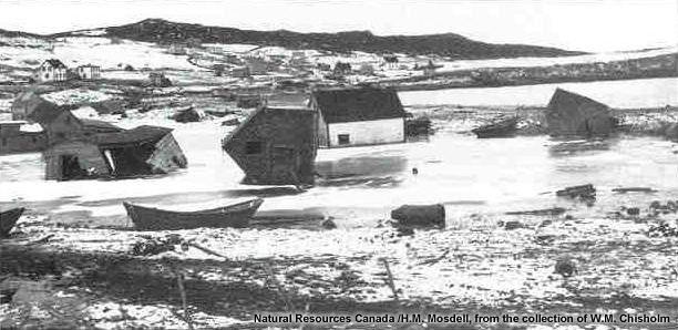 Buildings in Lord's Cove tossed and smashed by the 1929 Grand Banks tsunami in Nova Scotia.