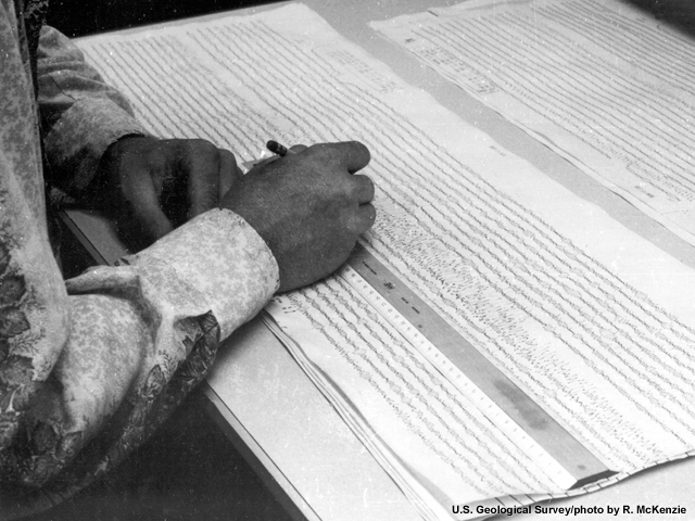 A geologist measures the seismogram of a Richter magnitude 6.7 earthquake in the Kermadec Islands.