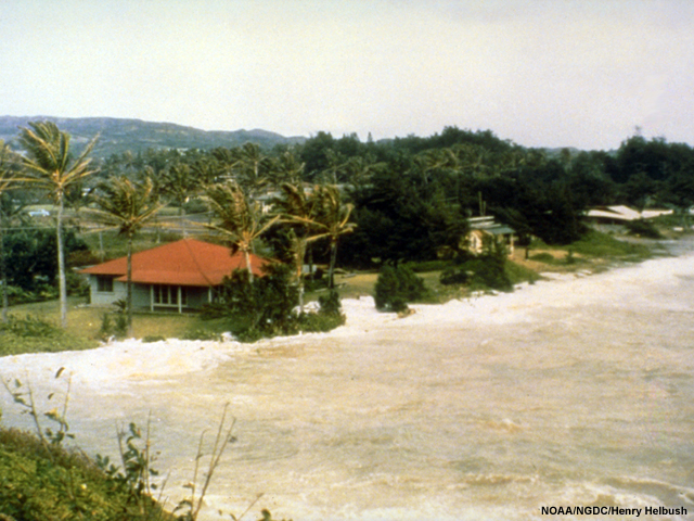 A low tsunami wave advances on Laie Point, Oahu, Hawaii.
